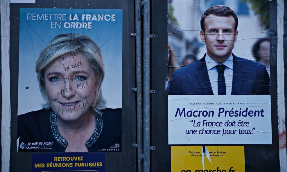 Predizborni plakati Marine Le Pen i Emmanuela Macrona na francuskim ulicama