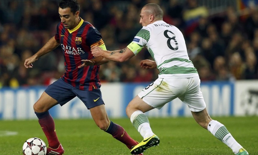 Barcelona - Celtic, Xavi (L) i Scott Brown