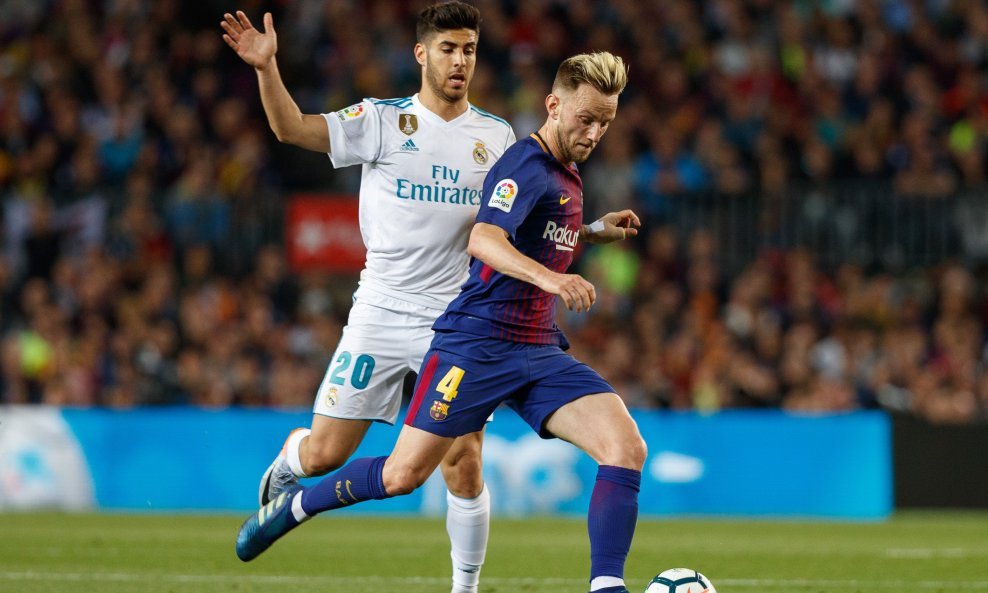 Marco Asensio (u bijelom dresu) i Ivan Rakitić