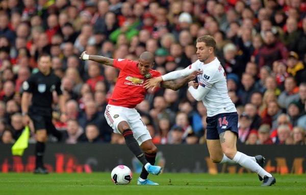 Manchester United (Ashley Young) - Liverpool (Jordan Henderson)