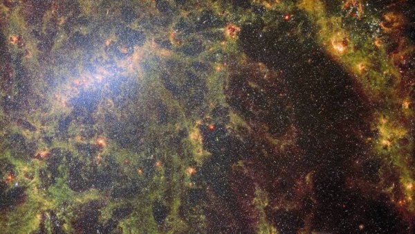 Kompozitna snimka udaljene galaksije prikazuje zvijezde ispred galaksije, kao i mjesto gdje nastaju mlade zvijezde.