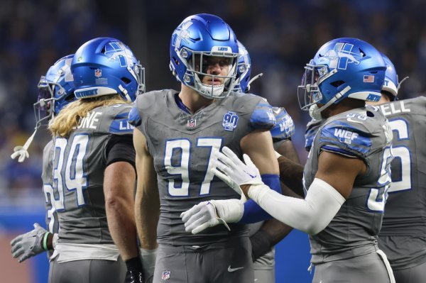 Detroit Lions - Aidan Hutchinson (97) i Derrick Barnes (55)