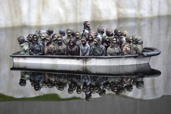 Imigranti, Reuters