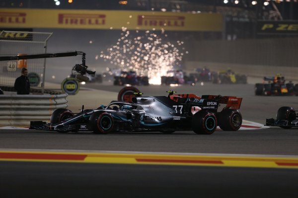 Valtteri Bottas (FIN) Mercedes AMG, Charles Leclerc (MON) Scuderia Ferrari